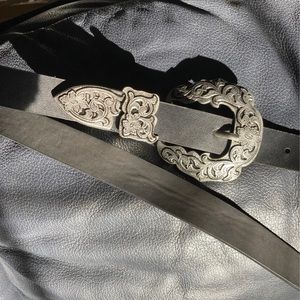 Black belt with silver detailed buckle